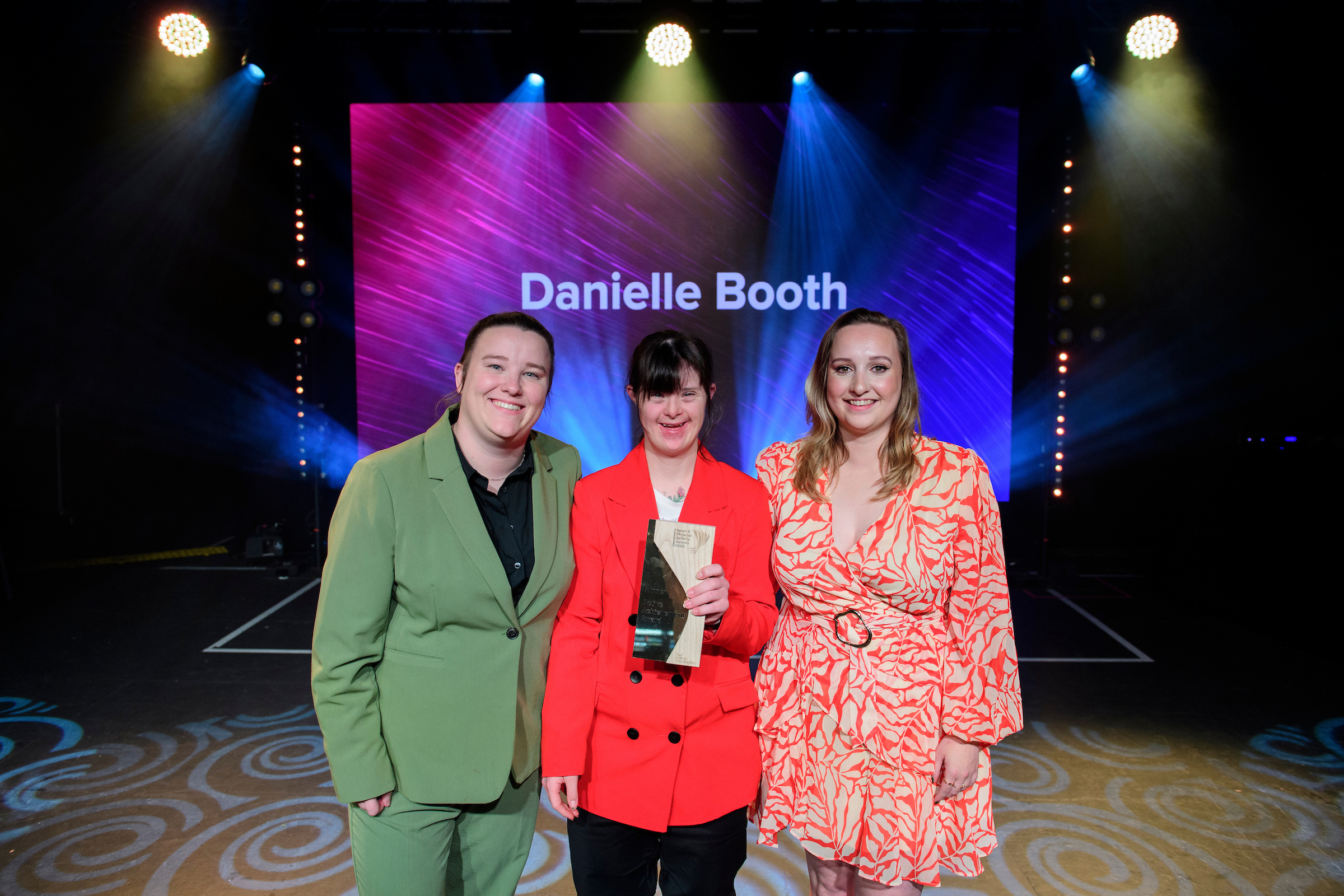 Danielle Booth collects the Active Achievement Award, presented by sponsors The Engine Shed